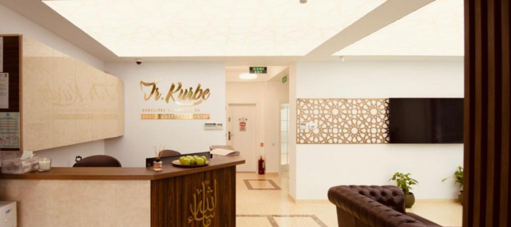 Modern and light main reception of Dr. Kurbe dental clinic in Bucharest, Romania